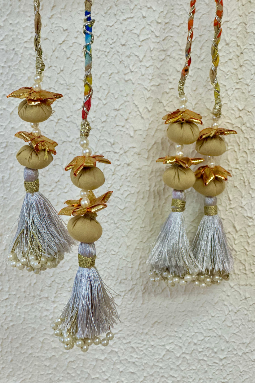 Beige printed potli