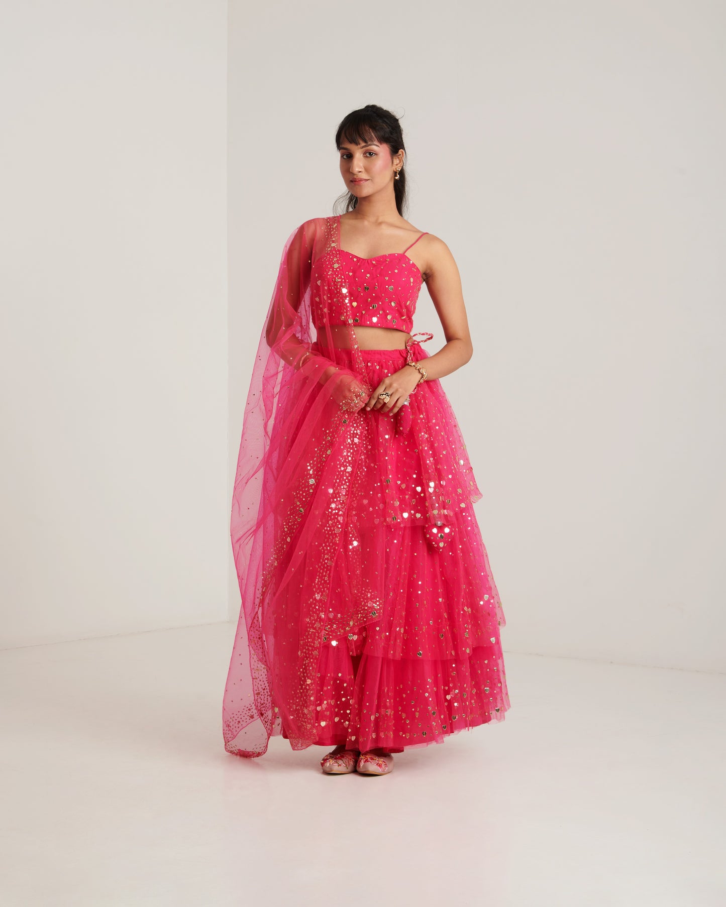 Hot pink net embellished lehenga set